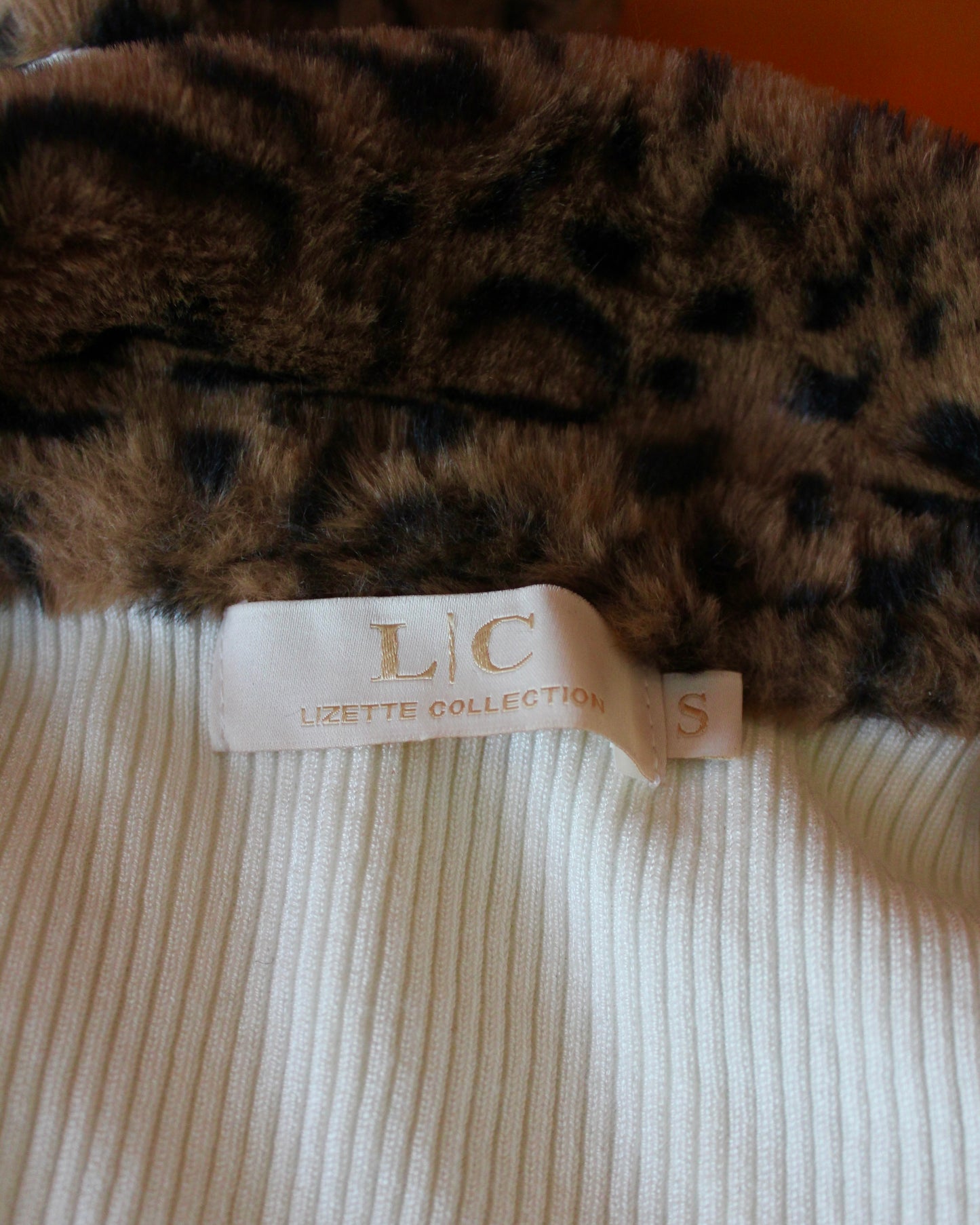 ZIP-UP SWEATER WITH LEOPARD PRINT TRIM