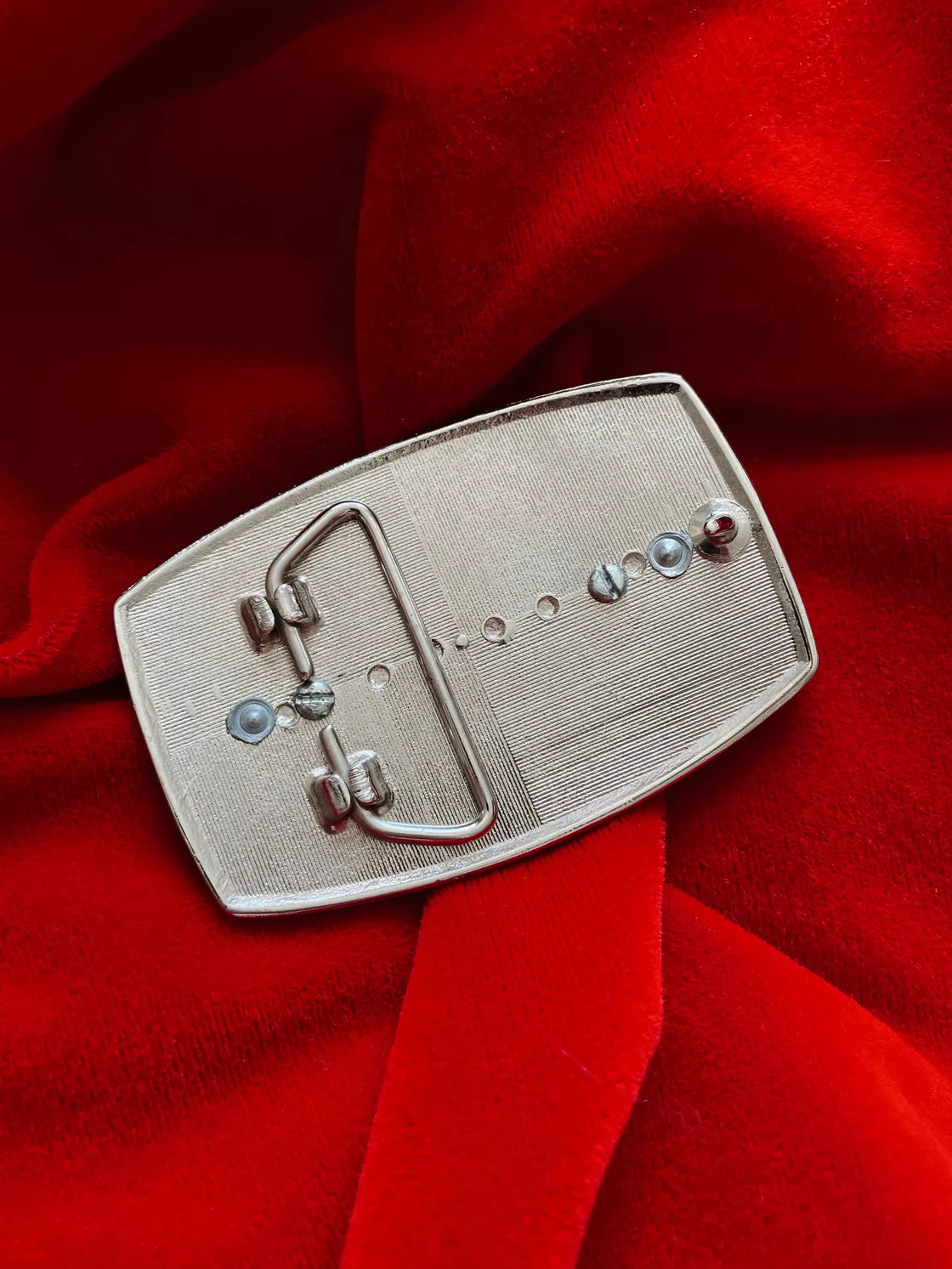 SILVER & GOLD BELT BUCKLE W/ RED STONE
