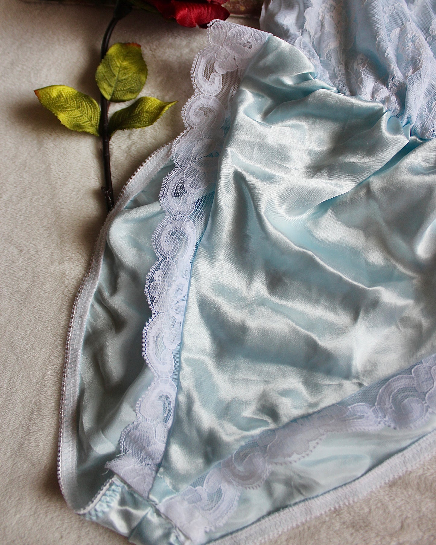 VINTAGE BABY BLUE BODYSUIT