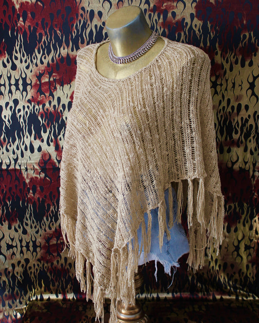 KNITTED FRINGE PONCHO