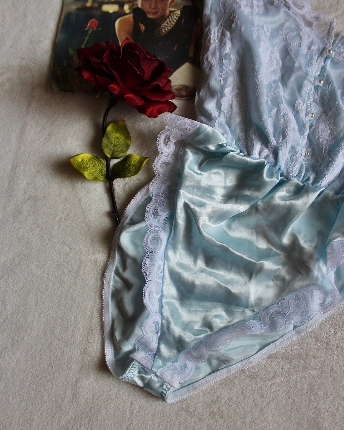 VINTAGE BABY BLUE BODYSUIT